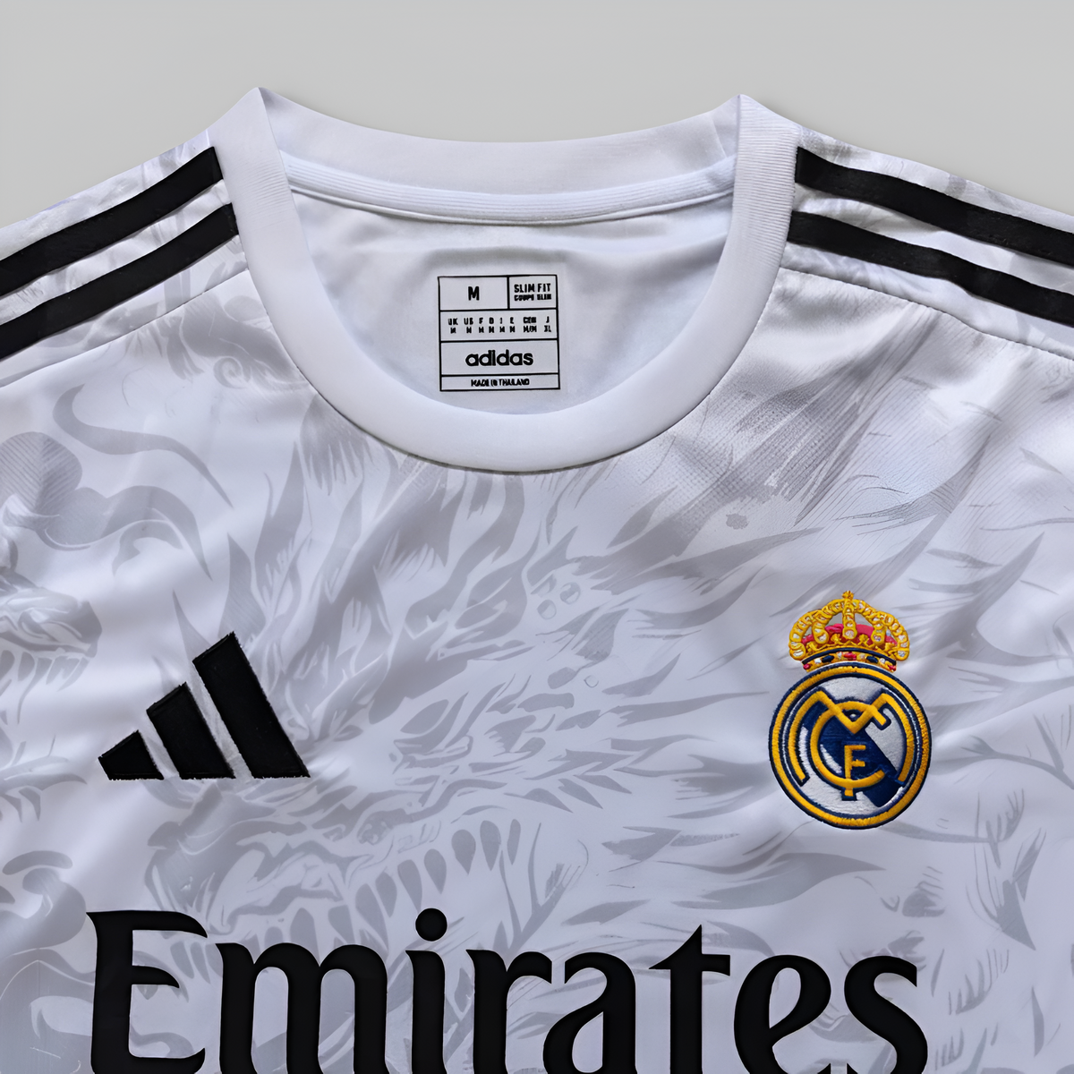 Real Madrid 25/26 Emerald Flame premium football jersey detail
